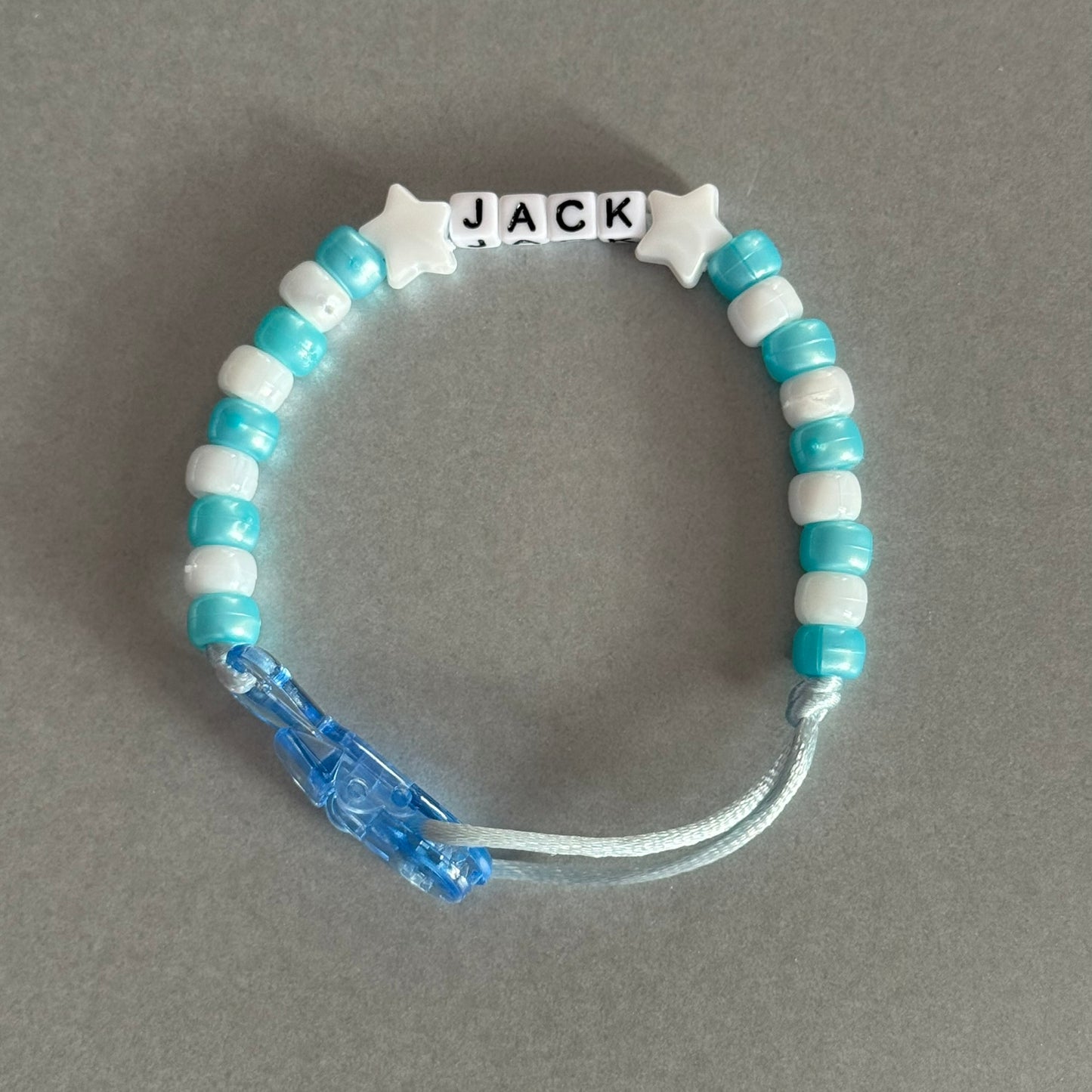 Personalised Reborn Dummy Clip: White Stars Pearl Blue & White Beads