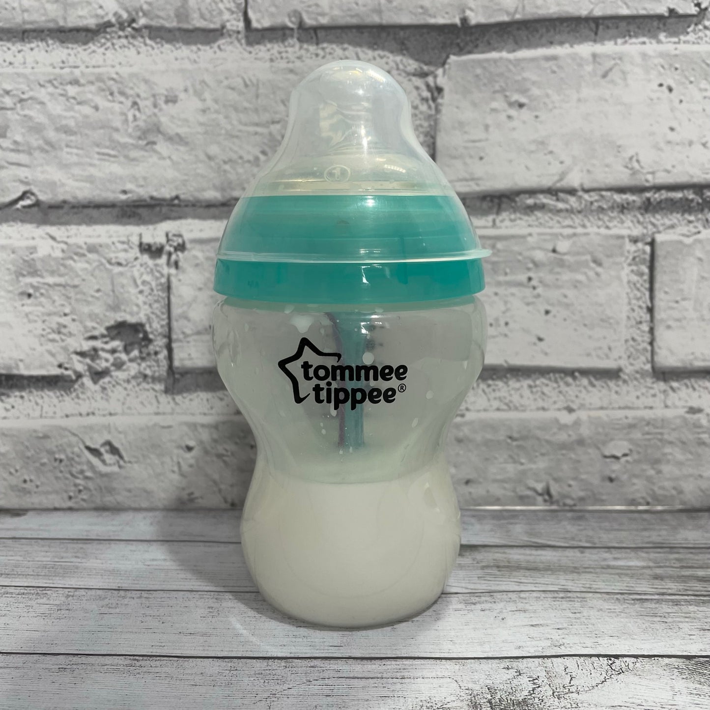 Tommee Tippee Aqua Anti Colic Reborn Fake Milk Bottle 9oz