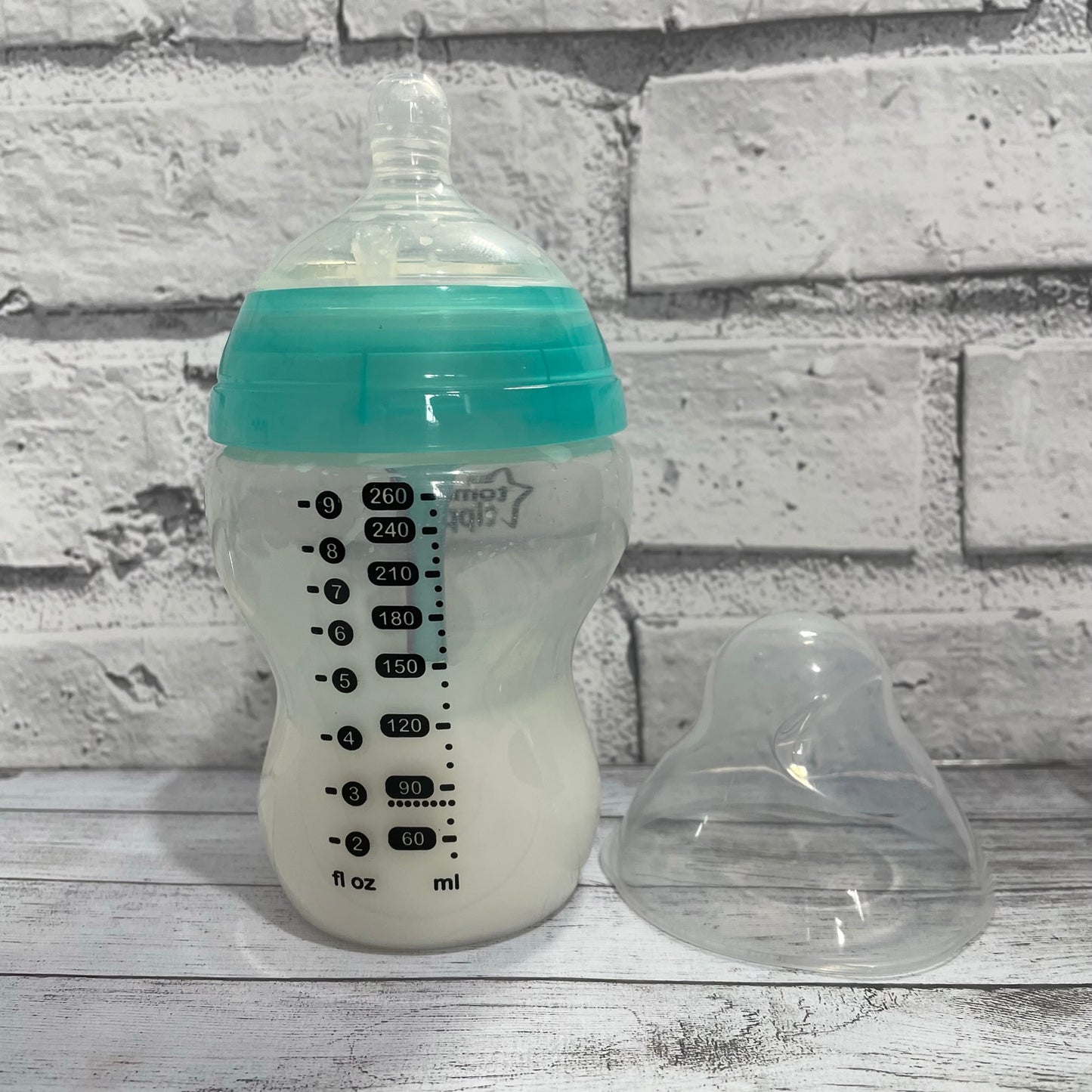 Tommee Tippee Aqua Anti Colic Reborn Fake Milk Bottle 9oz