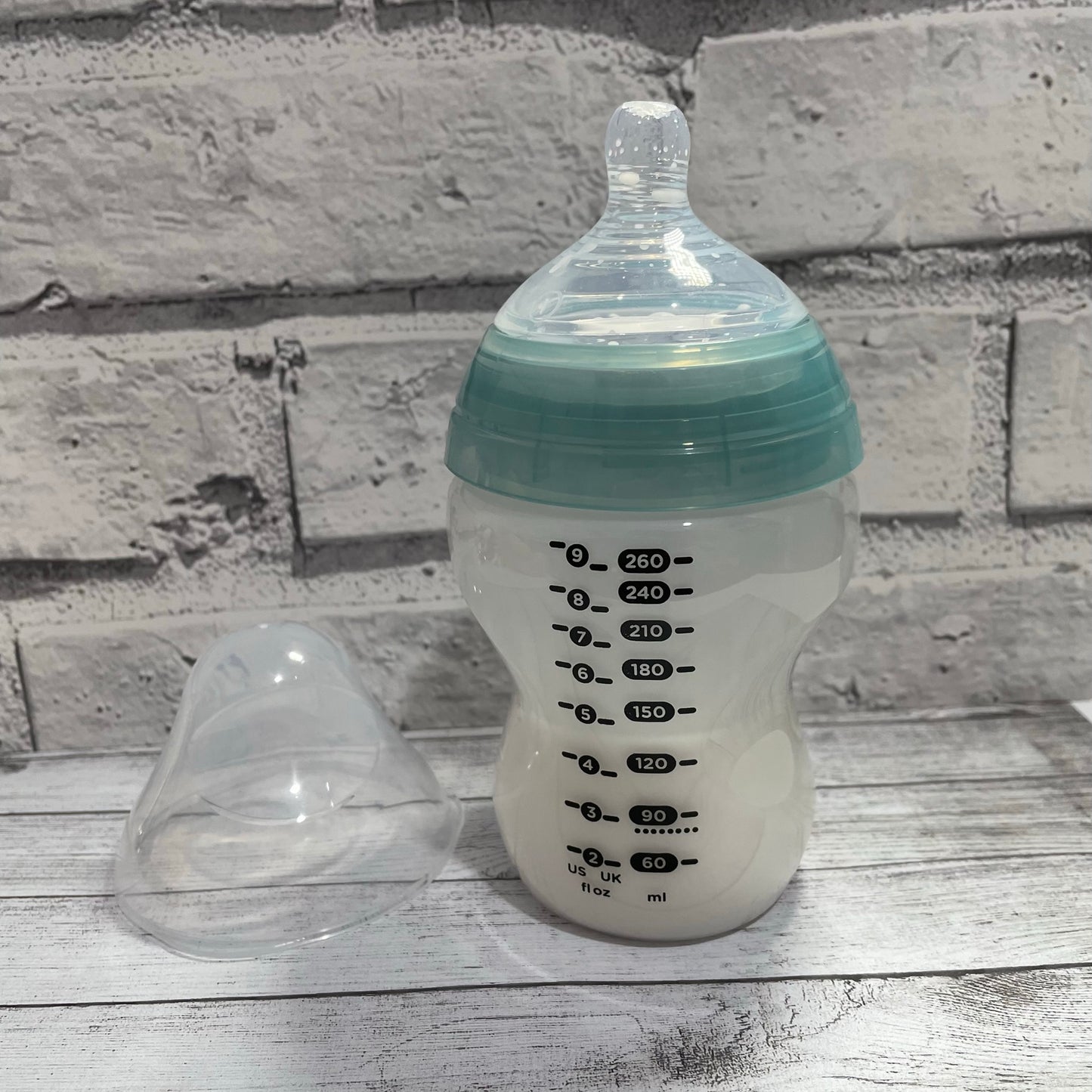 Tommee Tippee Blue/Green Anti Colic Reborn Fake Milk Bottle 9oz