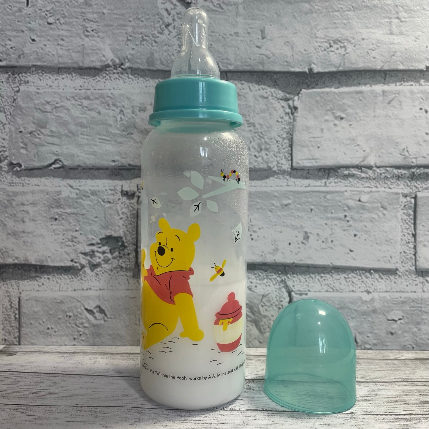 Winnie the Pooh Aqua Reborn Fake Milk Bottle 8oz