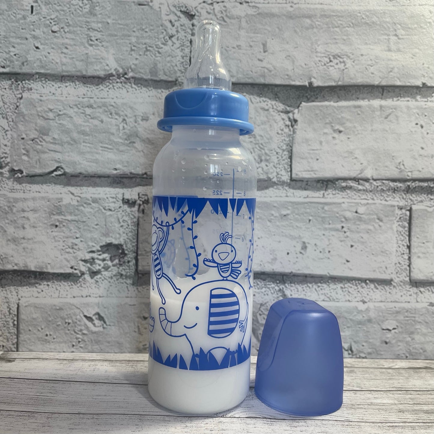 Tommee Tippee Tall Blue Jungle Reborn Fake Milk Bottle 9oz