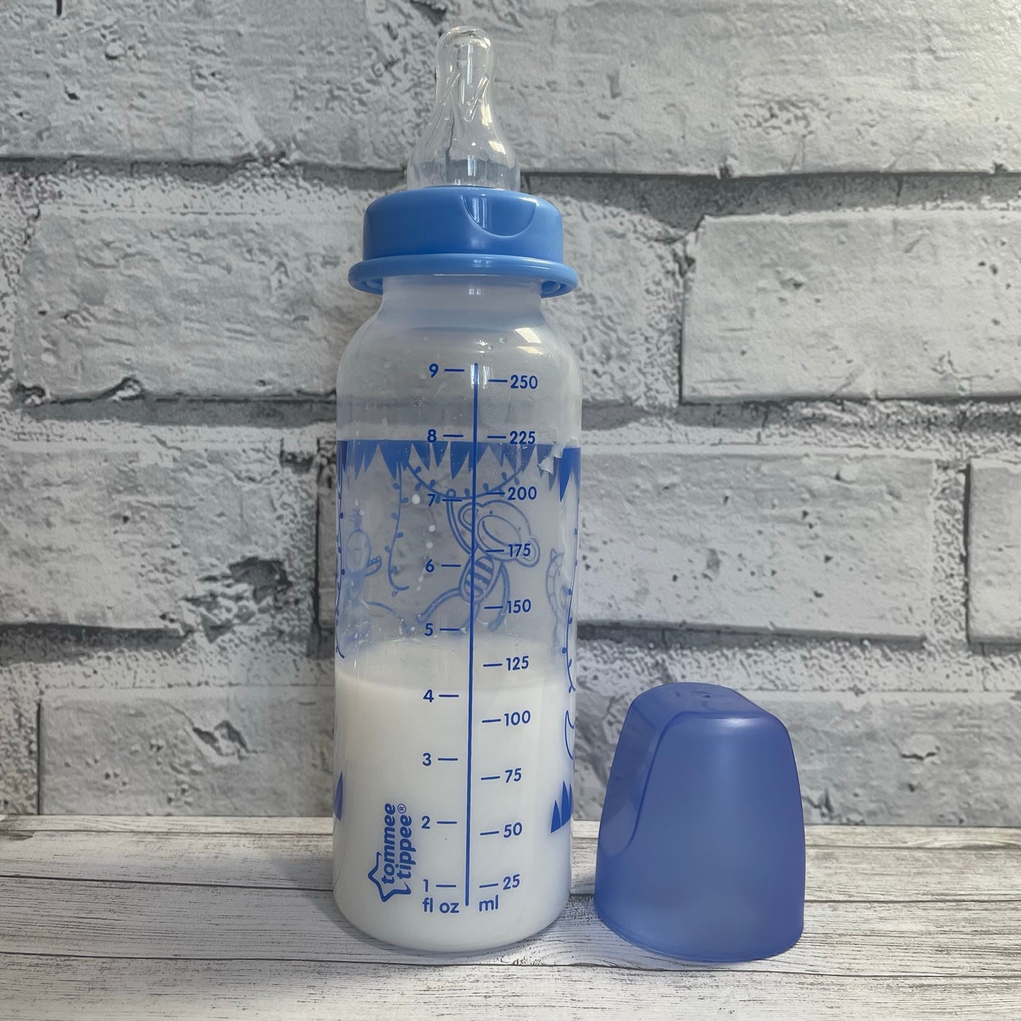 Tommee Tippee Tall Blue Jungle Reborn Fake Milk Bottle 9oz