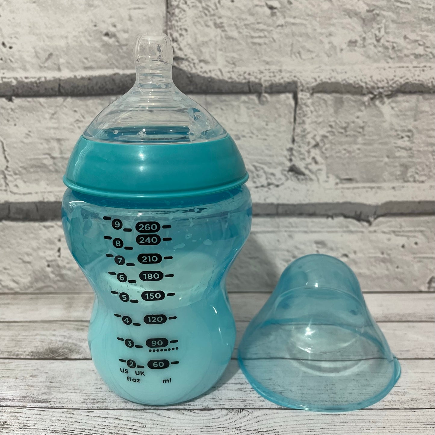 Tommee Tippee Turquoise Blue Reborn Fake Milk Bottle 9oz