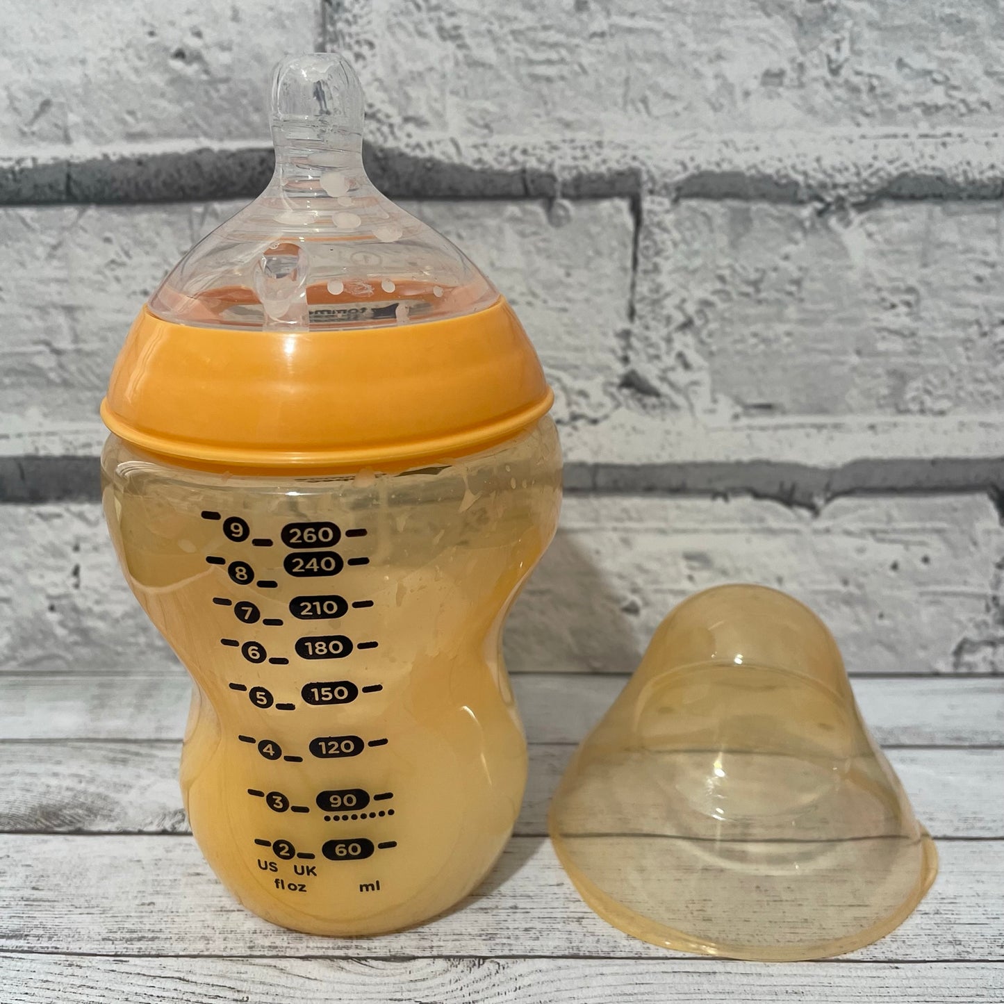 Tommee Tippee Orange Reborn Fake Milk Bottle 9oz
