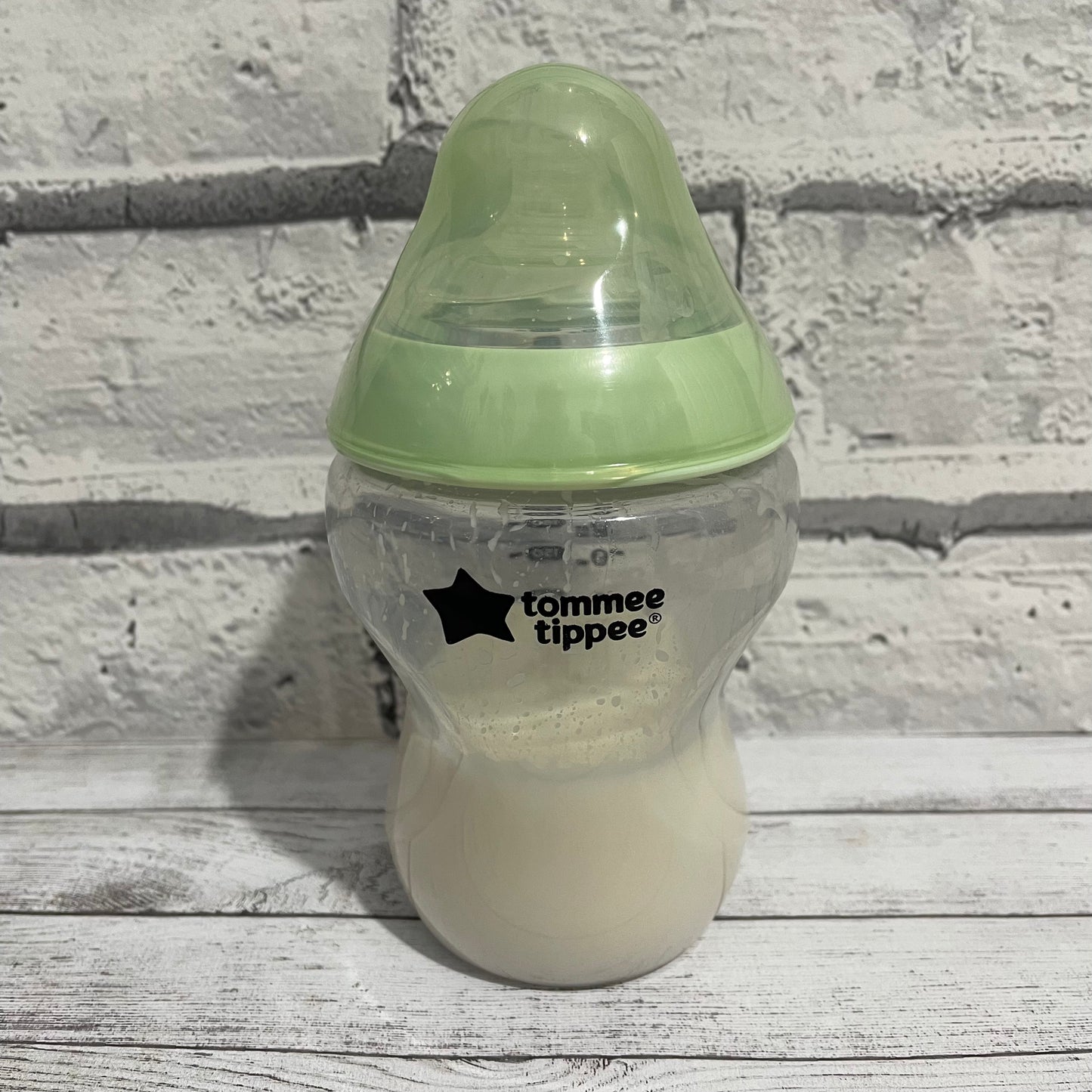 Tommee Tippee Pale Green Reborn Fake Milk Bottle 9oz