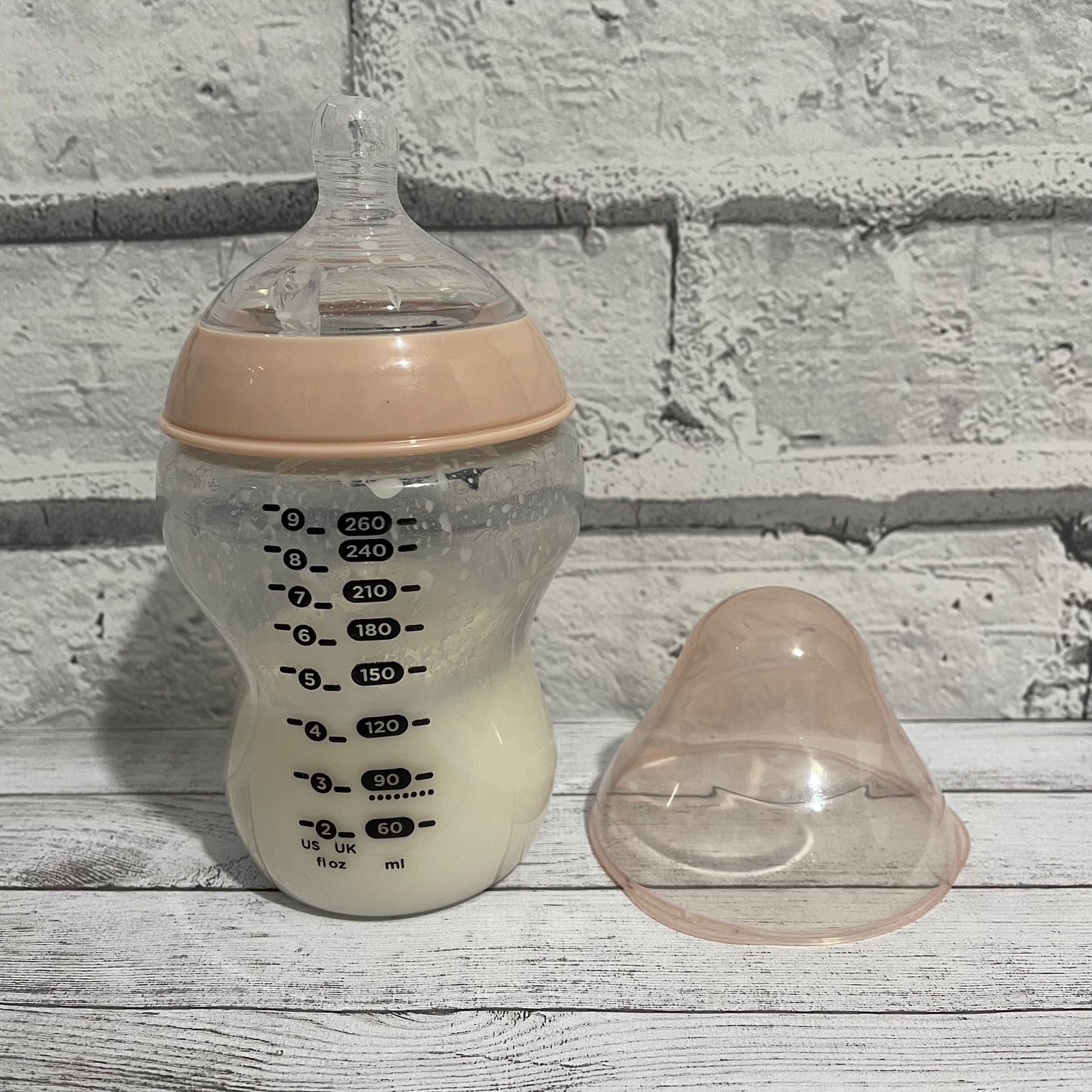 Tommee Tippee Peach Reborn Fake Milk Bottle 9oz