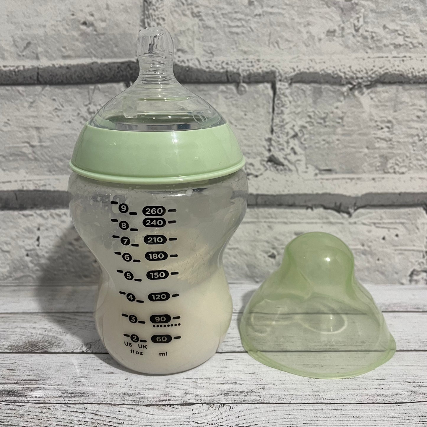 Tommee Tippee Pale Green Reborn Fake Milk Bottle 9oz