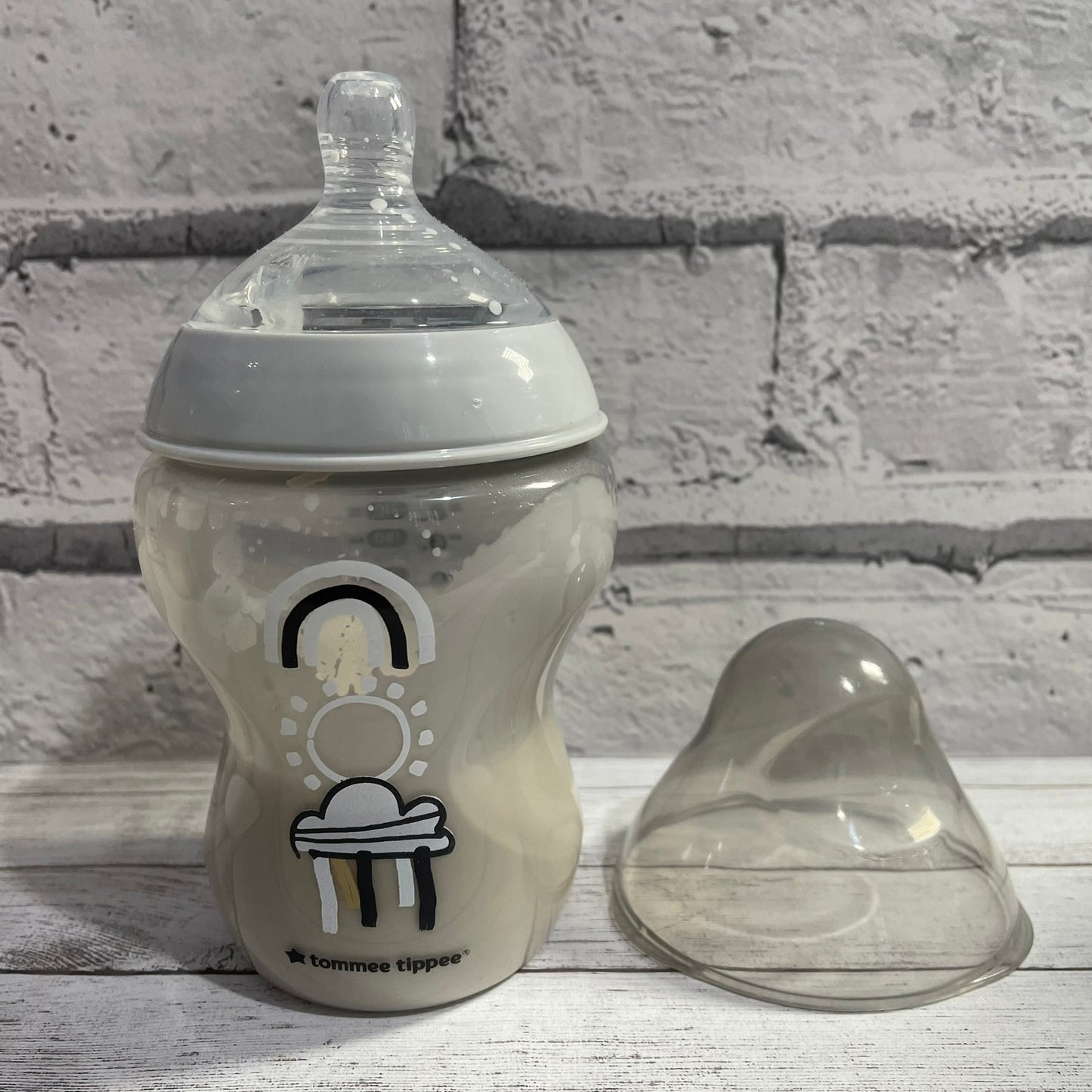 Tommee Tippee Grey Rainbow Reborn Fake Milk Bottle 9oz
