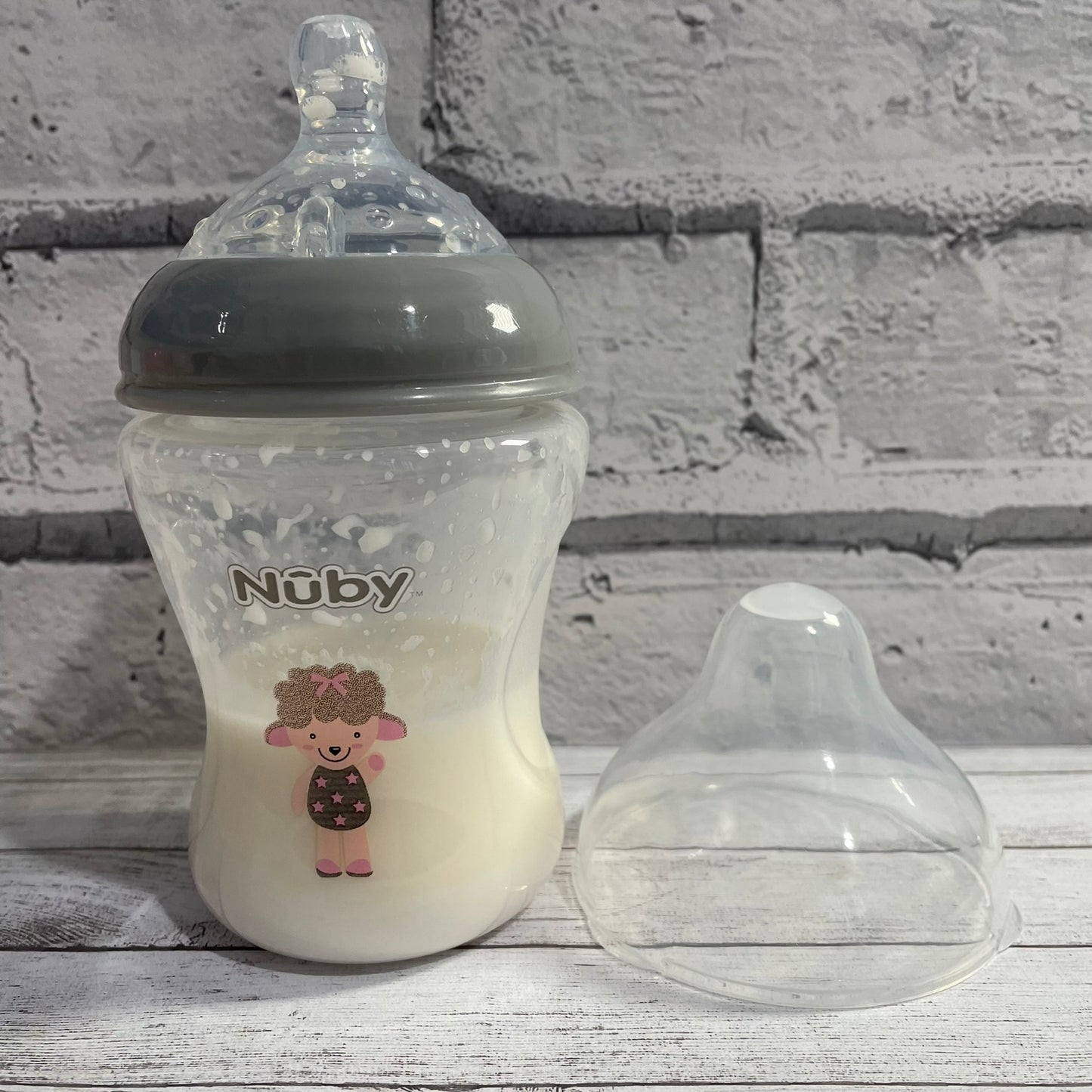 Nuby Grey Sheep Reborn Fake Milk Bottle 9oz