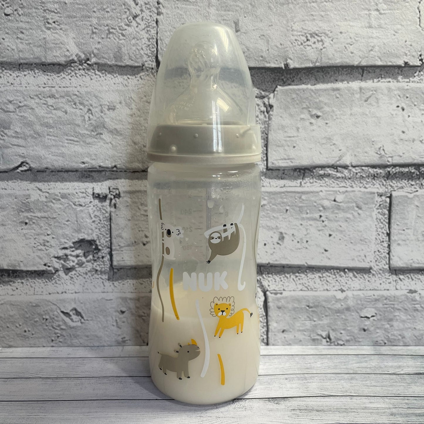 NUK Jungle Themed Reborn Fake Milk Bottle 10oz
