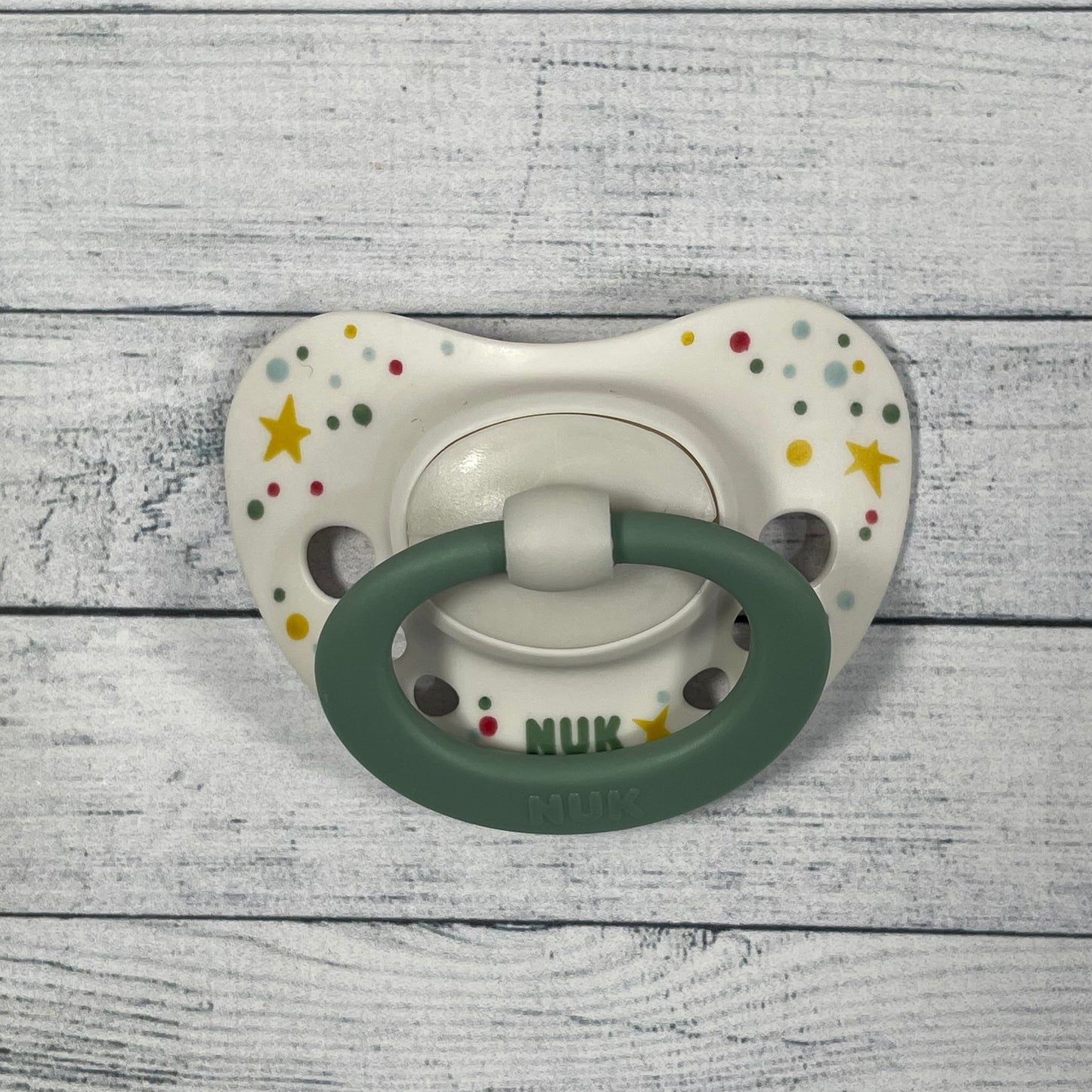 NUK Sage Green Stars Reborn Magnetic Dummy - self fit magnet