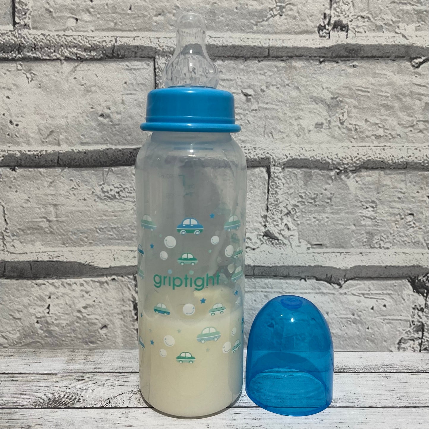 Griptight Blue Cars Reborn Fake Milk Bottle 8oz