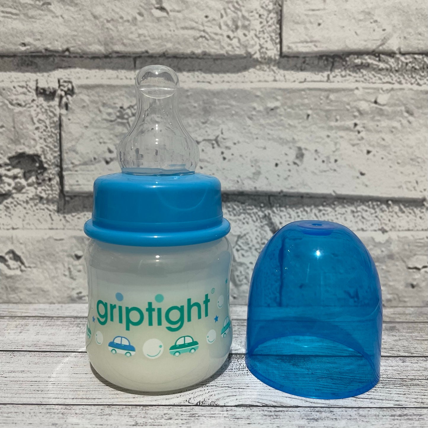 Griptight Blue Cars Reborn Fake Milk Bottle 2oz
