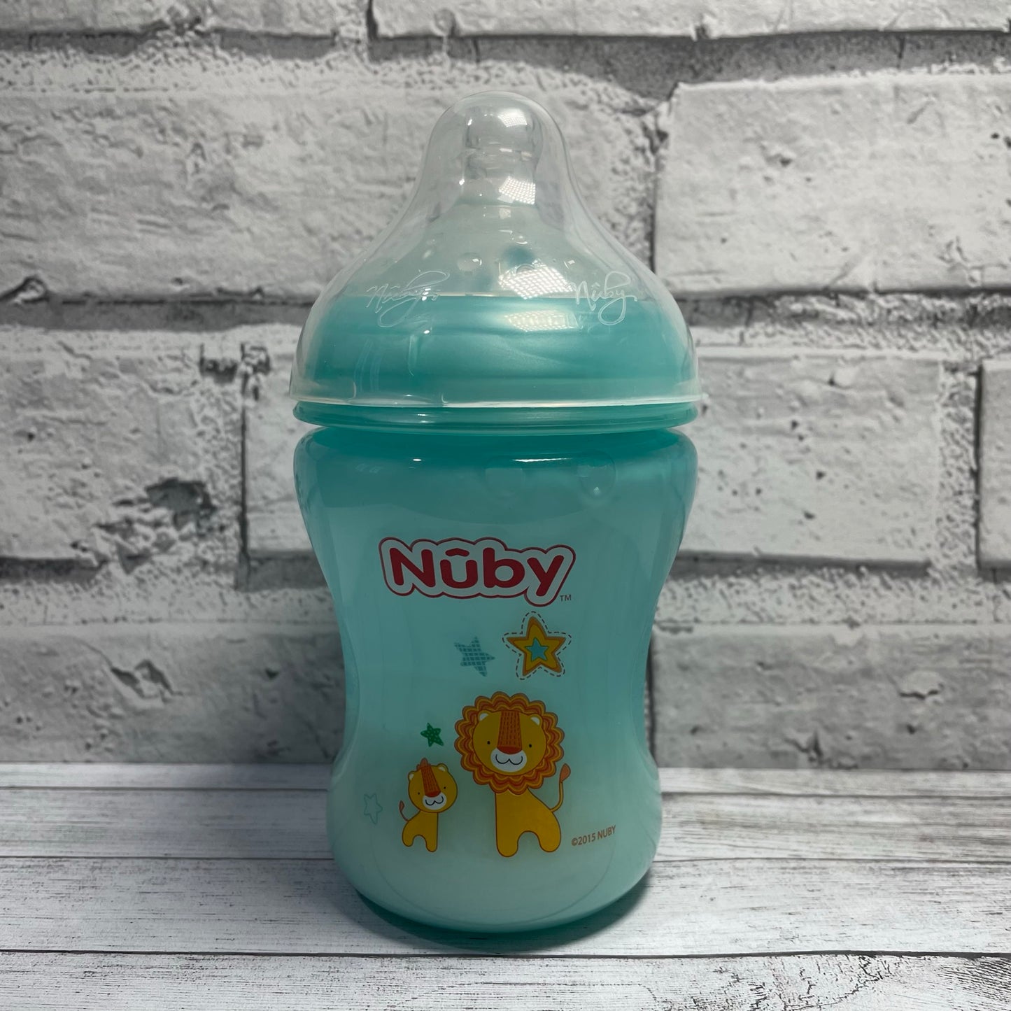 Nuby Aqua Lion Reborn Fake Milk Bottle 9oz