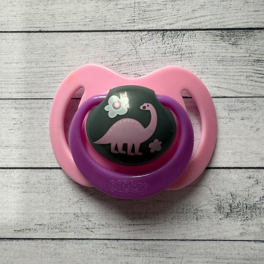 Nuby Pink Dinosaur Reborn Magnetic Dummy - self fit magnet