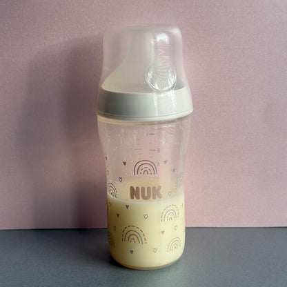 NUK Cream Rainbows Reborn Fake Milk Bottle 8oz