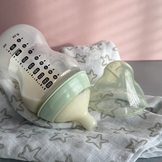 Tommee Tippee Pale Green Reborn Fake Milk Bottle 9oz