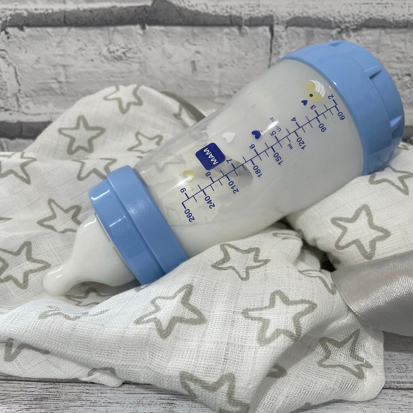 Blue MAM Reborn Fake Milk Bottle 9oz