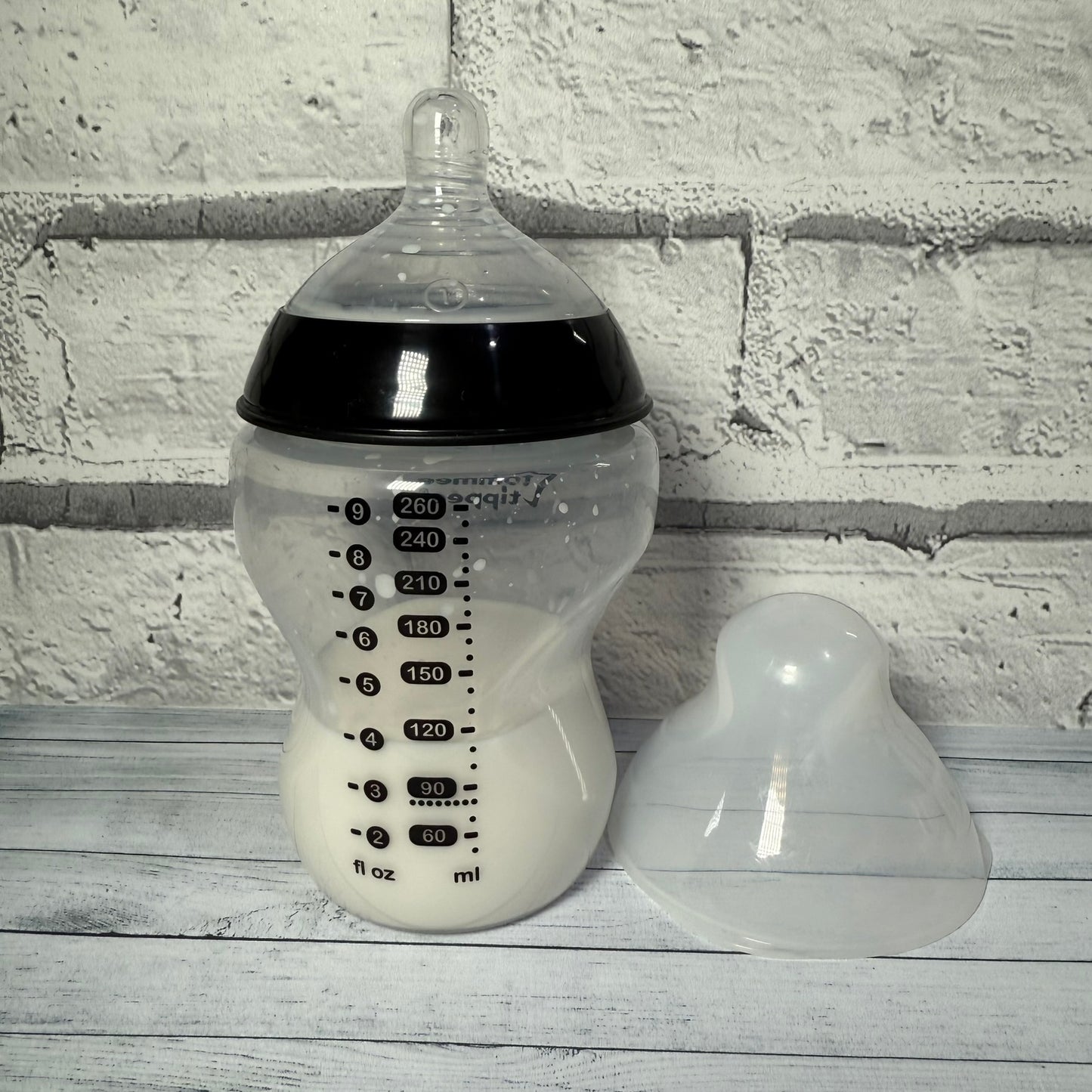 Tommee Tippee Black Reborn Fake Milk Bottle 9oz