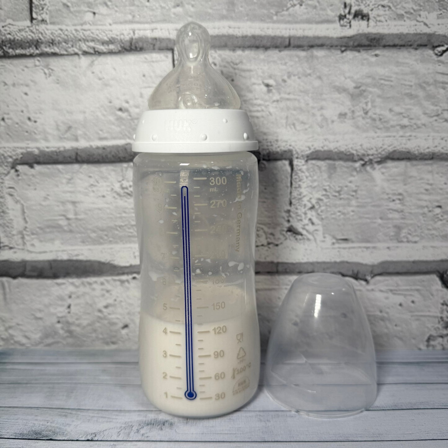 NUK White Reborn Fake Milk Bottle 10oz