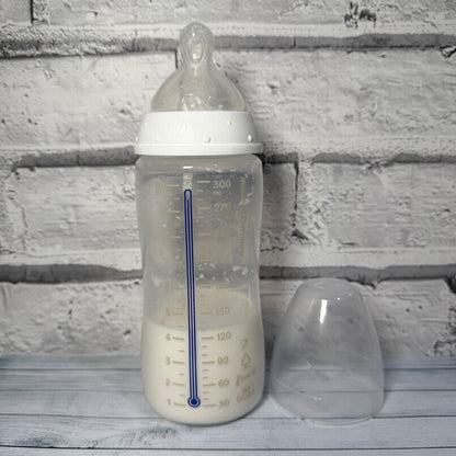 NUK White Reborn Fake Milk Bottle 10oz