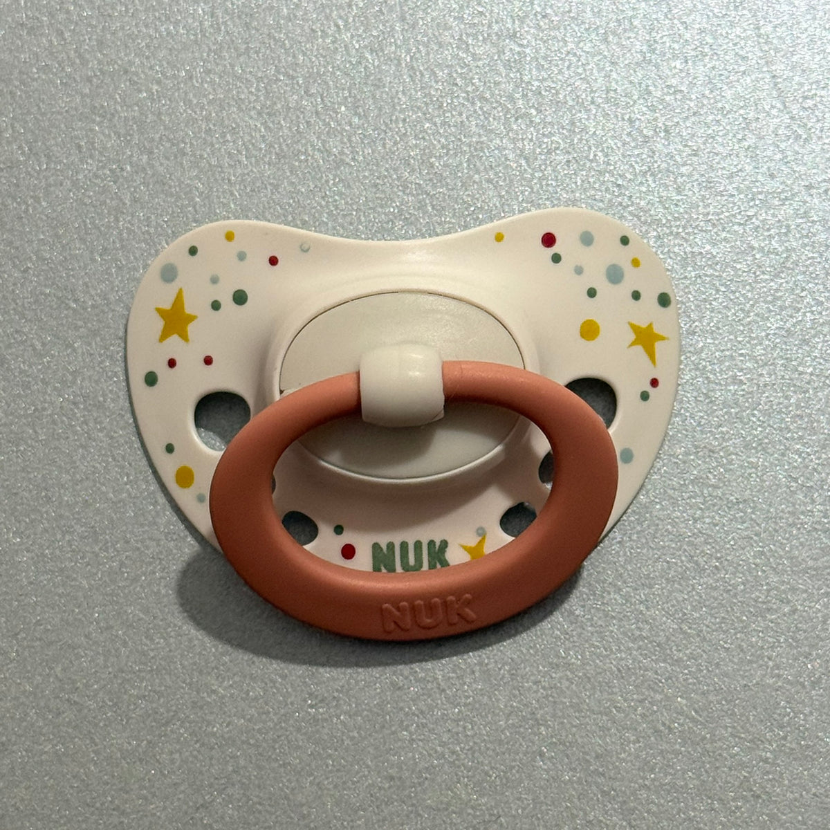 NUK Dusky Pink Stars Reborn Magnetic Dummy - self fit magnet