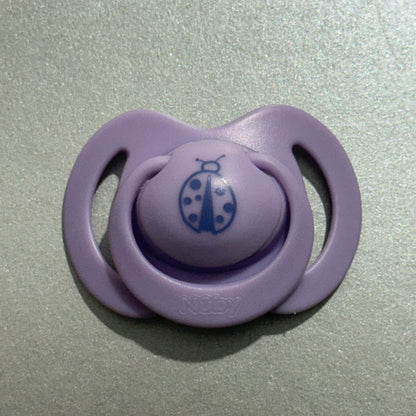 Nuby Lilac Ladybird Reborn Magnetic Dummy - self fit magnet